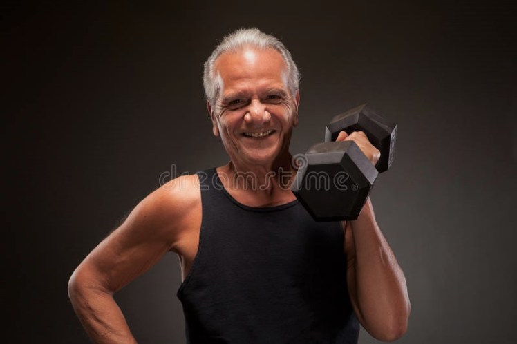 Senior man olding dumbbell.